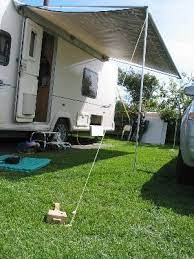 Putting Up A Roll Out Awning Step 4 Caravan Awnings Roll Out Awning Caravan Travels