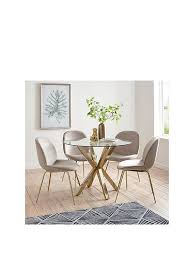 Best dining table should have several requirements such as easy going with most of the. Michelle Keegan Home Chopstick 100 Cm Round Brass Dining Table 4 Penny Velvet Chairs Brass Taupe Littlewoods Com