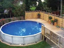 Getting An Above Ground Pools For Your Home Is A Big Decision But Isn T A Difficult Problem If You Swimming Pool Decks Swimming Pool Landscaping Backyard Pool