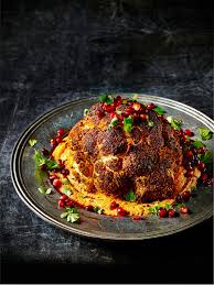 Whole Roast Cauliflower With Warm Harissa Hummus Recipe Harissa Recipes Roasted Cauliflower Vegan Cauliflower Recipes