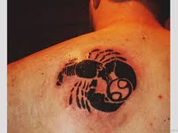 Pisces sign tattoo design on arm. 63 Fabulous Zodiac Shoulder Tattoos