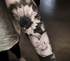 Black And Grey Realism Tattoo Artists Vancouver Realistic Sunflower Tattoo On The Arm Www Otziapp Com Black Flowers Tattoo Tattoo Style Tattoos