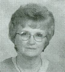 Who are the faculty members in the 2002 photo?