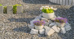 Rock garden gets its charm when it looks as if it was created by nature. Front Garden Rockery With Steles Of Granite And Flowers In Flower Stock Photo Picture And Royalty Free Image Image 148554130
