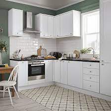 Kitchen splashbacks are a perfect example of how kitchen planning and interior design have become intertwined. Trentie White Gloss Metro Ceramic Wall Tile Pack Of 40 L 200mm W 100mm Diy At B Q