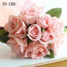 Here's a unique wedding centerpiece design that uses citrus fruit as a vase for flowers. Online Shop Gorgeous 22cm Silk Pearl Rose Wedding Bouquets Bride Bouquet Bridal Wedding Flower Decorations Wedding Flowers Bridal Bouquets White Bridal Bouquet