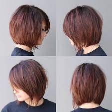 Warm Brunette Shaggy Bob With Fringe And Side Swept Bangs The Latest Hairstyles For Men And Women 2020 Hairstyleology Short Hair Styles Bob Haircut With Bangs Short Bob Hairstyles
