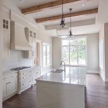 Warm White Kitchen Cabinets Cabinet Color Is Bm Ballet White Walls Sw Accessible Beige Via Laurie Ch Beige Kitchen Kitchen Colors Beige Kitchen Cabinets
