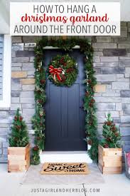 I had so much fun decorating our front porch for the holiday! How To Hang Outdoor Christmas Garland Around The Front Door