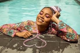 Use a cool hair accessory to fasten braids for kids into a cute little updo hairstyle. Sho Madjozi S Mixed Up Pan African Rap The New York Times