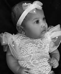 Esther Grace, Esther Grace you're beautiful. Esther Grace, Esther Grace  you're wonderful You're light from heaven. You light up our whole world  You're light from heaven. You light up our whole world