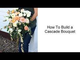 Directions add three calla lilies to your green styrofoam disc. Workbench Basics Teardrop Bouquet Youtube Artificial Bridal Bouquets Cascading Wedding Bouquets Romantic Bouquet Wedding