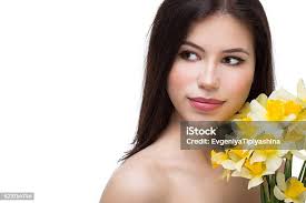 Woman Holding Yellow Daffodils Stock Photo