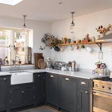 If your style is more of a true country farmhouse kitchen, rough wood cabinetry is the recommended choice. Modern Country Kitchen Dark Grey Shaker Kitchen Cabinets With Prismatic Ribbed Glass Hangi Modern Country Kitchens Grey Shaker Kitchen Shaker Kitchen Cabinets