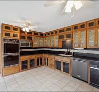 Replacing cabinet door paneling instead of the whole door