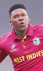 Amsterdam says Sportsman-ofthe-year award was inspiring DCC congratulates  Imlach and Nedd