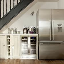 On the left of the place where the refrigerator goes, is a walkway to the dining room. Creative Ways To Use The Space Under The Stairs Ideal Home