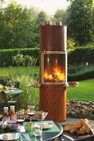 Eleganter Outdoor Kaminofen Ascot Mit Einem Komplett Aus Edelstahl Gefertigtem Feuerraum Samt Grosszugiger Glastur Foto C Feuerstelle Glasscheiben Kaminofen