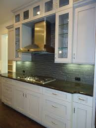 Pin By Brandi Hudgins On A R H Kitchens Kitchen Design Staining Cabinets Black Kitchens