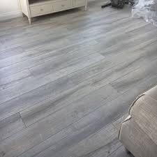 Tile that looks like wood is called wood look tile, wood grain tile, wood plank tile, wood look porcelain tile, faux wood flooring, and faux hardwood floor tile. Cardinham Almond Wood Effect Tile Large Format Tileflair
