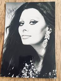 When I look at Sophia Loren, I see the ideal woman in every sense. She sets  the bar so high. This is one of my many autographed pictures from her, seen  here