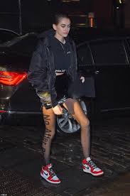 Kaia Gerber Wearing Air Jordan 1 Retro High Og Chicago Sneakers Alexander Wang No After Party Tig Jordan Outfits Womens Black Women Fashion Sheer Black Tights
