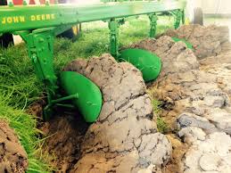 Use a garden fork to loosen the soil at the bottom of the trench. Why Do They Do That Plowing Or Tilling Fields Iowa Agriculture Literacy
