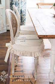 These little slipcovers are perfect for covering up straight back chairs like your dining room chairs or you can make them for old wooden chairs that you may need for extra seating in the living room or den. Dining Chair Slipcover Tutorial Miss Mustard Seed