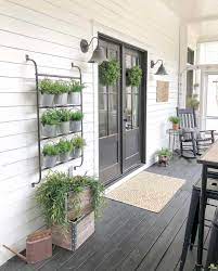 Enamel mug décor and organizer. 30 Gorgeous And Inviting Farmhouse Style Porch Decorating Ideas