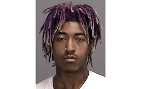 Suspect in violent robbery arrested with gun