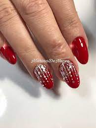 If you like edgy and bright nail designs, abstract manis can be a compelling option. Red N Silver Christmas Nails K Christmas Nails Easy Christmas Nail Art Easy Holiday Nail Designs