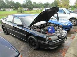 Image result for Black 2001 Impala