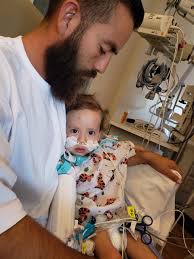 For ailing kids, this heart surgeon is the quarterback of a winning team