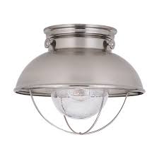 American made nautical flush mount ceiling fixture with a compass design in the frosted glass shade, mounted on a metal base. Marine Nautical Close To Ceiling Light Brushed Stainless Sebring By Sea Gull Lighting 8869 98 Destination Lighting