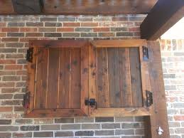 wood doors in brick cabinets