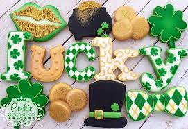 You use the same cookie cutter to cut out the rolled fondant and apply it to the cookie with a little bit of corn syrup. 84 Irish Decorated Cookies Ideas In 2021 St Patrick S Day Cookies Cookies Cookie Decorating