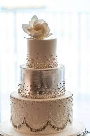 See why we're lovin' roaring 20's themed weddings. A Pinterest Approved Trend You Ll Love Beaded Wedding Cakes Beaded Wedding Cake Silver Wedding Cake Cake