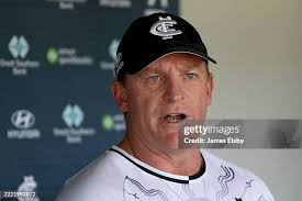 Players warm up during a Carlton Blues AFL training session at Unley...  News Photo