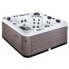 Hot tub in deck with storage cabinet.outdoor patios. What Temperature Should A Hot Tub Be Just Hot Tubs