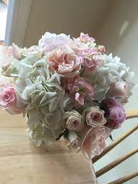 Bridal bouquet with hydrangeas roses and freesia. White Hydrangea Peach Stock Blush Pink Spray Roses Light Pink Peony And Pink Rose Bouquet Then Centerpi Light Pink Peonies Pink Rose Bouquet White Hydrangea