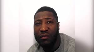 Dad battered mum holding their baby in her arms