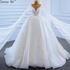 Das hochzeitskleid ist frauenthema nummer eins bei einer bevorstehenden hochzeit. Ruhigen Hill Muslimischen Weiss Luxus Brautkleider 2021 Cape Sleeves Perlen Perlen Glitter Lace Up Braut Kleid Hm67228 Wedding Dresses Aliexpress