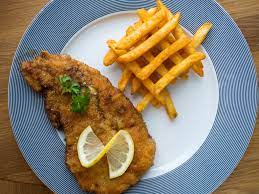 Lay the breaded pork cutlets in a single layer on a plate lined with parchment and refrigerate, uncovered, for 10 to 12 minutes to allow the coating to dry out a little and adhere to the pork. German Pork Schnitzel Schweineschnitzel The Best Recipe
