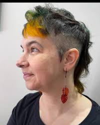 Fun lil' pixie fairy! It's a smidge of vivid color blocking and a whole  lotta badass energy coming at ya. Vivid colors don't have to always be a  rainbow punch in the