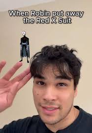 Robin Puts Away Red X in Teen Titans