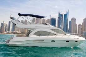 Matching the boat's unique design are its unusual proportions; Boat Rental Dubai Yacht Charter Click Boat