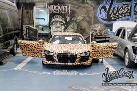 We feast our eyes on the enormously reflective glowing vehicular artwork that is monsters tron inspired audi r8. Pin On Cart Wrap Ideas