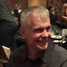 What advice or recommendations do you have for building a garage with a  workshop, storage, and hobby area, considering design, layout, bylaws, and  contractors?