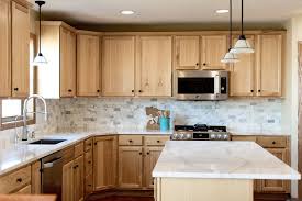 White kitchen cabinets with black granite countertops. Quartz Countertops Guide To 15 Kitchens Doing It Right