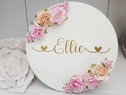 Every spring, when we visit cape may, new jersey, i l love going into the quaint little boutiques and i always admire the wooden flowers that i see there. Floral Personalised Sign Wooden Round Name Plaque Wall Etsy Personalized Plaques Name Plaques Wooden Name Plaques